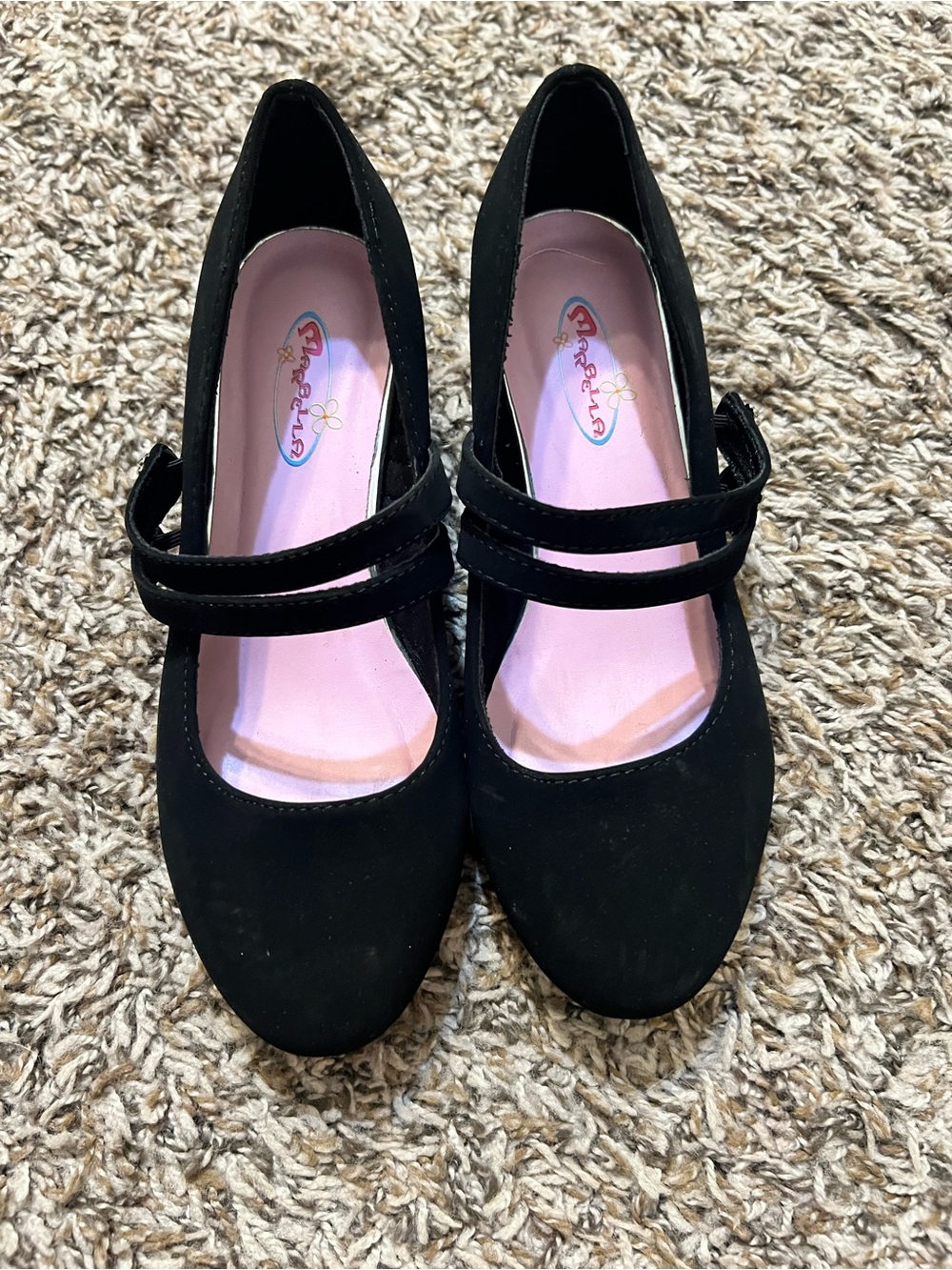 Girl’s black high heel shoes. Size 4